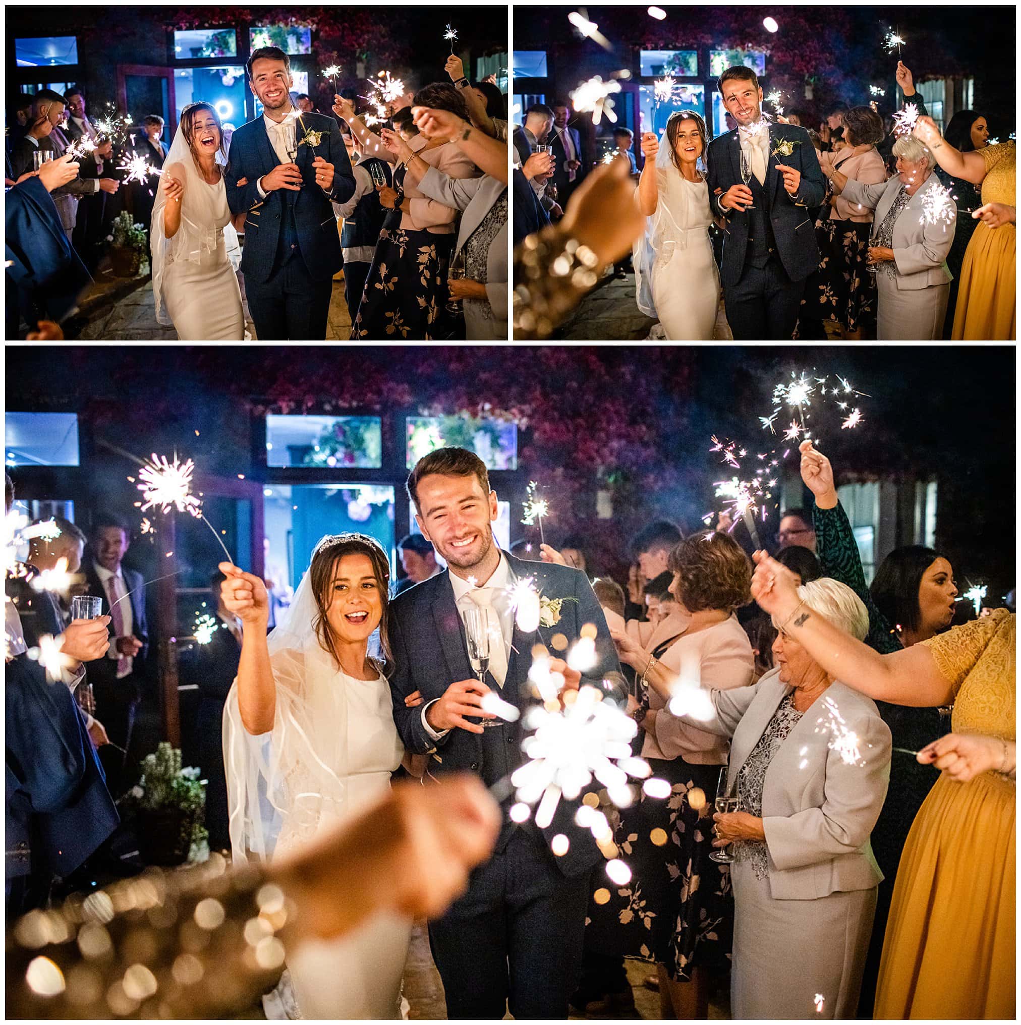 bride and groom with sparklers at fairyhill gower
